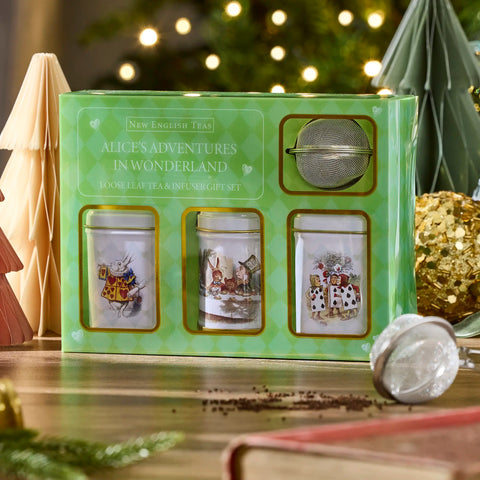 Tea set packaging with illustrations of characters from 'Alice's Adventures in Wonderland' on a festive background.