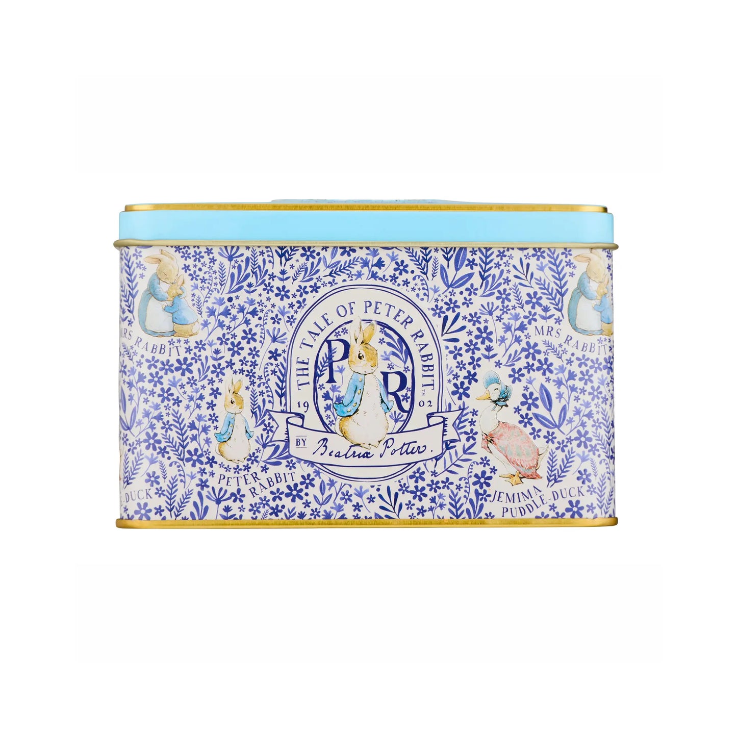 A rectangular metal tin with a light blue lid and gold trim, decorated with a blue floral pattern and illustrations from Peter Rabbit, including Beatrix, Peter Rabbit, and the title 'The Time of Peter Rabbit'.