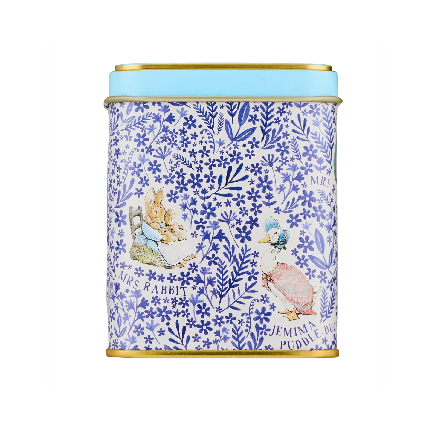 A cylindrical metal tin with a light blue lid and gold trim, decorated with a blue and white floral pattern and Beatrix Potter characters including Mrs. Rabbit and Jemima Puddle Duck.