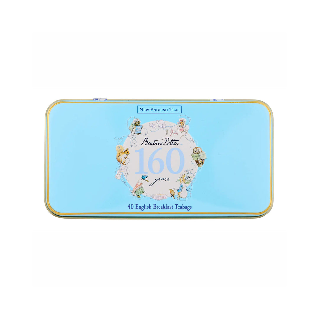A light blue rectangular metal tin of New English Tea with a gold border and a central illustration celebrating 160 years of Butler & Potter, shown on a plain white background.