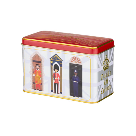A rectangular metal tin with a red lid and gold trim, featuring illustrations of British guards in uniform and the words 'Guards of London' on a white background.