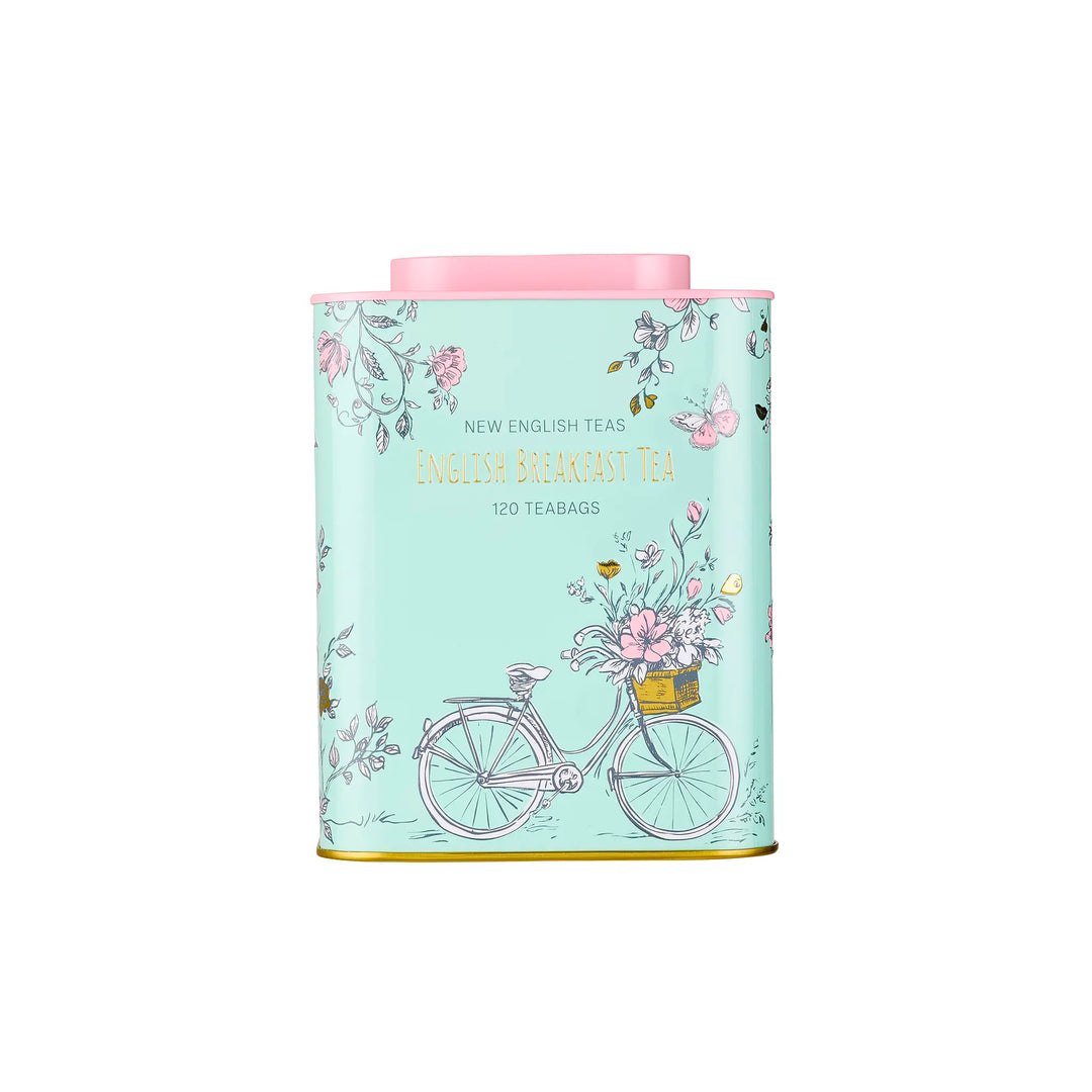 Tea canister with floral design and bicycle illustration on a light blue background
