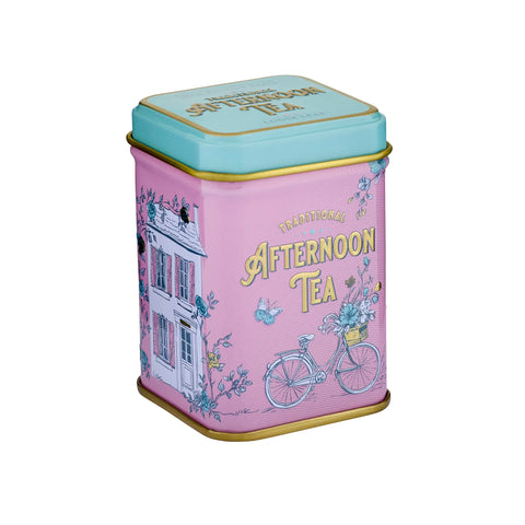 A single mini tea tin with pink background a lettering that reads 'Afternoon Tea'