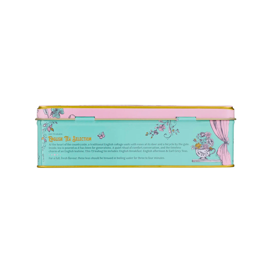 A rectangular metal tin box with a pastel aqua front, pink lid, and gold trim, featuring decorative floral illustrations and the title 'Tea Time Selection' on a white background.