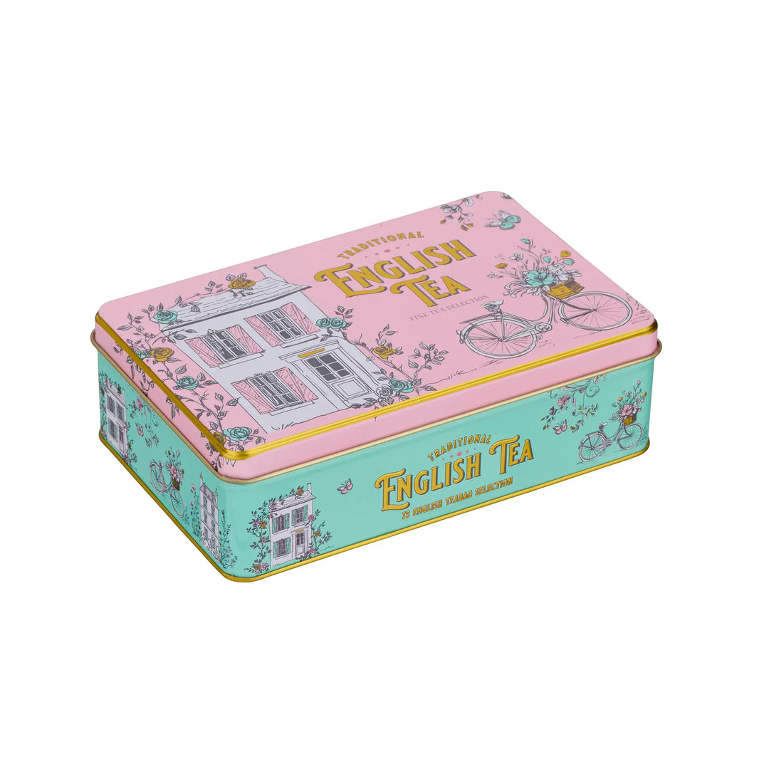 A decorative rectangular metal tin of traditional English tea, featuring a pink lid with a bicycle and house illustration, and a mint green side panel with gold lettering.