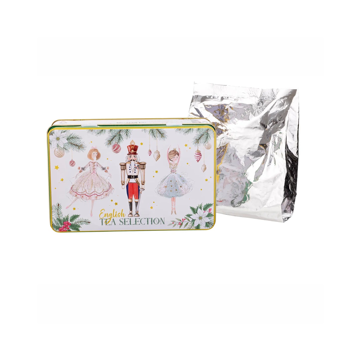 A decorative rectangular tin labeled 'English Tea Selection' with illustrated characters and holiday motifs, shown in front of a silver foil tea bag pouch on a white background.