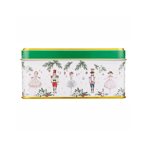 A rectangular metal tin with a white body decorated with Christmas nutcracker illustrations, green pine branches, and red berries, featuring a bright green lid with gold trim.