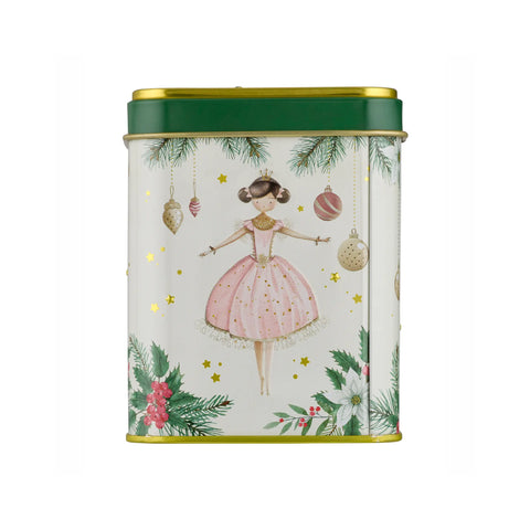 A rectangular metal tin with a festive Christmas design, featuring a ballerina in a pink dress, hanging ornaments, pine branches, and white flowers. The tin has a dark green lid with gold trim and a gold-colored bottom edge, set against a plain white background.