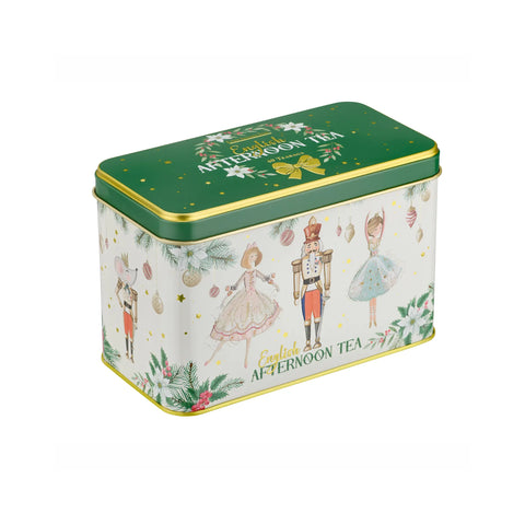 A rectangular metal tea tin with a green lid and gold trim, decorated with Christmas nutcracker illustrations and the text 'English AFTERNOON TEA' on a white background.