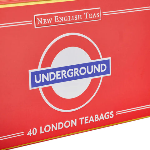 A close-up of a red tea bag box featuring the London Underground roundel logo and the text 'New English Teas' and '40 London Teabags'.