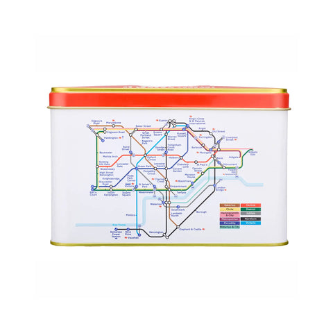 A rectangular metal tin with a white body printed with a colorful transit map design, topped with a bright orange-red lid and finished with gold-toned edging, shown on a plain white background.