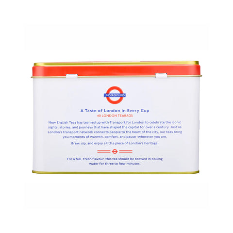 A white cylindrical metal tea tin with a red lid and gold trim, featuring the 'New Tea of London' and 'Transport for London' collaboration branding on the front, set against a plain white background.