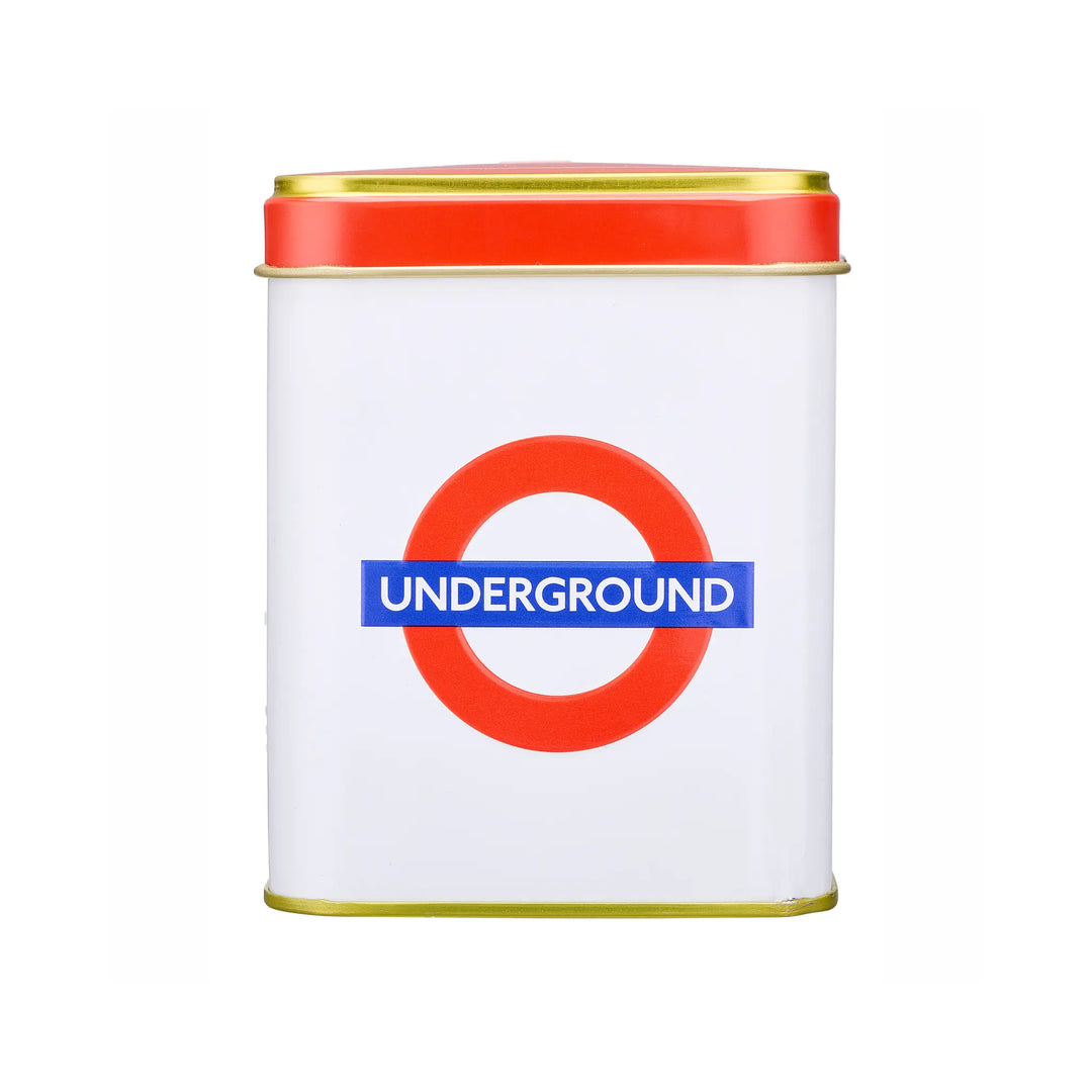 A square white metal tin with a red lid, featuring the red and blue London Underground roundel logo on the front.
