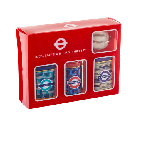 A red gift set box containing a loose leaf tea and infuser gift set. The set includes three small tea tins with London Underground-themed labels (DLR, Underground, Elizabethan) and a metal tea infuser visible in a clear window.